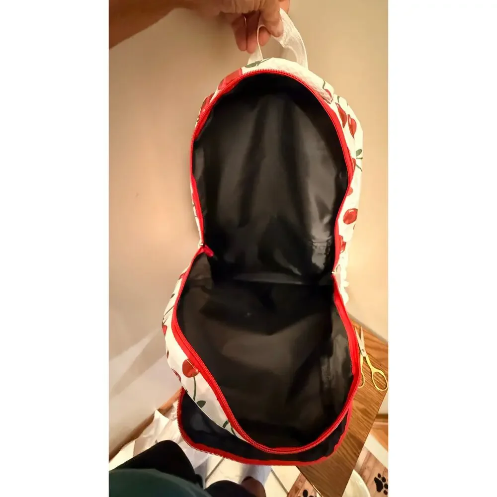 New white backpack cherry pattern.Padded back,multiple pockets,adjustable straps